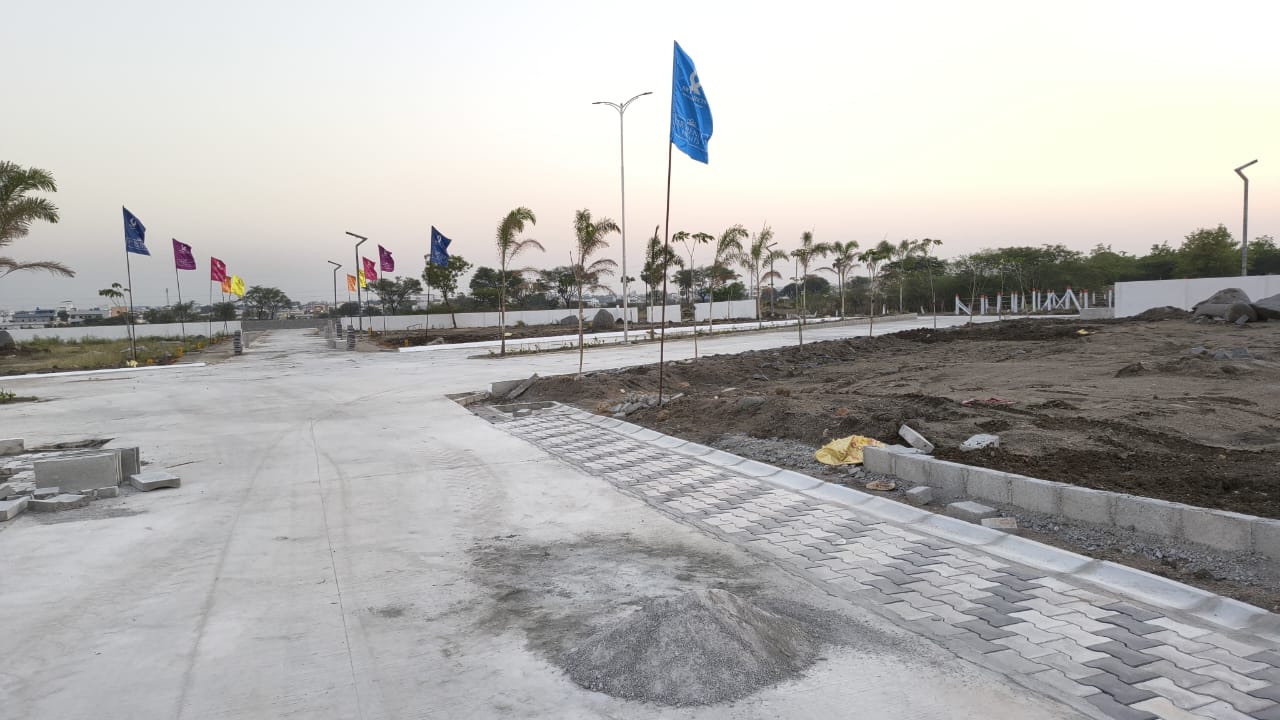 Site photo — internal road with flags