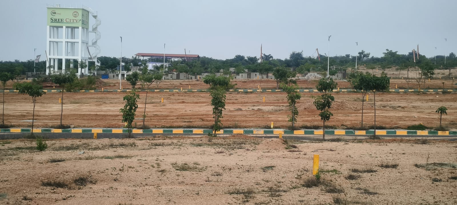 Open plots — 'SREE CITY' in background
